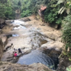 The bottom half of the cascade is a small water slide made out of rocks