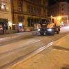 A street sweeper in Budapest, cleaning the tram lines at night 