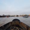 The bow (front) of our boat heading towards the floating market