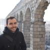 Smiling in front of the aqueduct