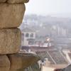 The aqueduct is built with granite blocks stacked on top of each other 