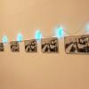 I have been seeing pieces with light fixtures at different museums as well, but I really liked the mix usage in this piece of both photos and lights.