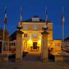 French flags fly proudly outside Courseulles city hall