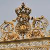 When you mention "Versailles" to a French person, they immediately think of extreme riches, like this gate with the emblem of the king that is covered in gold!  