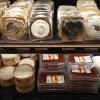 Soft cheeses, except for those brown blocks on the bottom, which are jelly made from the quince fruit to pair with a good cheese