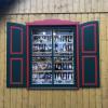 One window filled with glass ornaments