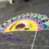 This kolam depicts the traditional method of cooking pongal (a good made of rice cooked with water and milk and flavoring) in a clay pot