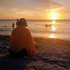 Songhee enjoying a beach sunset at Playa del Ritmo