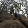 Mallika climbed up some of the big rocks on the mountainside
