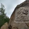 This is Green Tara, or a Bodhisattva (demi-god) in Buddhism who is always ready to help humans toward enlightenment