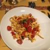 Handmade Italian pasta with tomatoes for dinner