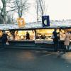 Shops selling bread, Christmas cards, cheese, and smoked reindeer meat at the market