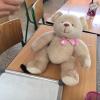 And she bought this teddy bear, too