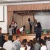 ...made an appearance at school to deliver presents to randomly chosen children in every class!