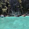 Several long-tail boats, a common sight in Thailand