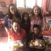 Here's all of my siblings and cousins with whom I celebrated, wearing their tikas and holding their large plates of offerings 