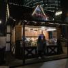 Many of the booths are built to look like traditional log cabins