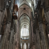 The extremely high ceilings inside of the church and the intricate details on the outside of the church are characteristic of Gothic style architecture