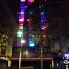 A hostel lit up in pretty colors