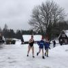 My teammates run to the car after finishing a sauna 