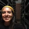 Standing in front of the "wet" collection shelves, containing organisms best preserved in alcohol 