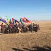 These flags are part of the decorations in preparation for a parade to honor the horses. 
