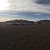 Quintessential Mongolia: gers against grass and foothills. 