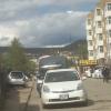 The street just outside my school. You can see the ger districts on the hills in the back.