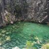 The water was so clear at the bottom of the waterfall