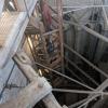 Staircases like this one, along with stone steps, help people climb up to the cathedral spire