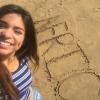 Playing with the soft, golden sand in Morocco