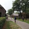 This is my friend Josh exploring an old traditional Dutch house! Can you see how thick the roof is? That's because it's made of many, many, many layers of straw! I hope it doesn't leak when it rains!