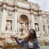 People throw pennies and make wishes in the Trevi Fountain