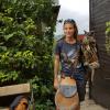 A bird trainer holding an owl