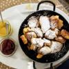 A big pan of Kaiserschmarrn with plum syrup and applesauce!