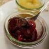 Kaiserschmarrn is served with plum compote, which is warm plums with sugar and cinnamon