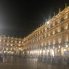 La plaza mayor lights up at night so people can still hang out