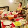 Josh enjoys the fruits of his labor with a happy mom and dad. 