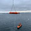 The autonomous underwater vehicle (AUV) being lifted from the water back onto the S.A. Agulhas II