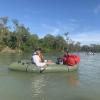 About to paddle into a flooded forest in the Mekong River