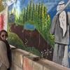 Morgan in front of some graffiti in Aqaba, Jordan