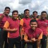 Boys before a shot put event on Sports Day