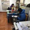 Designs are painted on by hand