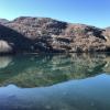 The reservoir is fed by Río Ésera (Ésera River), which brings cold and clear water from the mountains