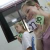 My friends, Millie and Lauren, trying to learn Lao letters