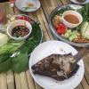 A regular meal in Luang Prabang: veggies, grilled fish, noodles, and spicy sauce