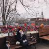 The fence behind me is full of various locks