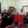 Presenting my mentors with t-shirts from my college, University of Richmond