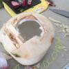 Cutting up exotic fruit including the hard-to-open coconut!