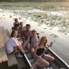 Rowing through a local lotus farm